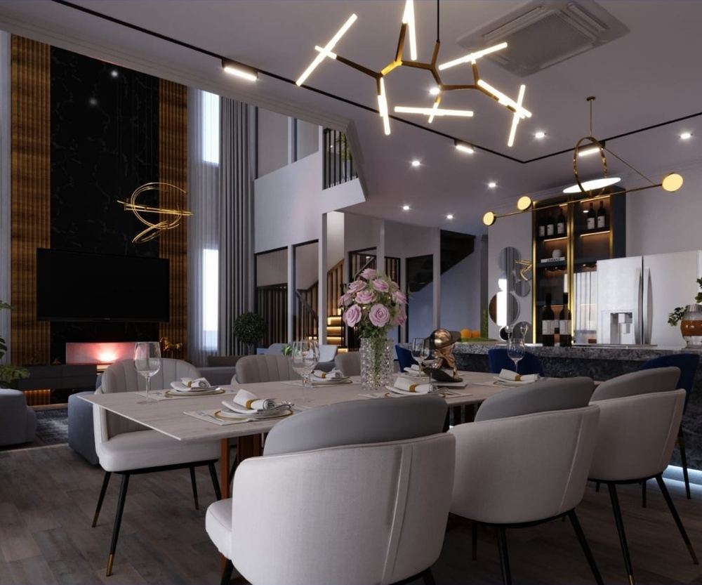 Edmonton Villa at dusk, the sweeping entrance canopy lit from below