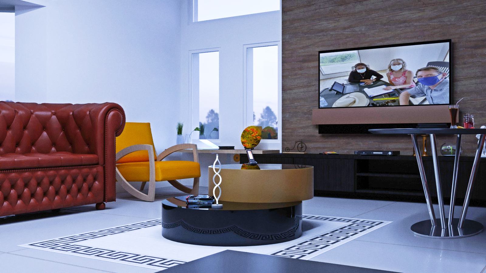 Remodelled open living space with a polished floor, wall-mounted screen and contemporary seating